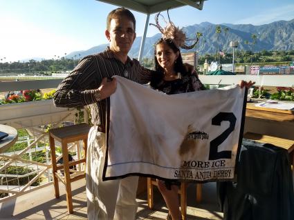 Robb Levinsky and Kenwood co-owner posting with More Ice's saddle cloth from the Santa Anita Derby on April 6, 2019