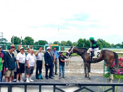 Mandel, with Jose Ferrer in the irons, wins by 14 lengths in race 8 at Monmouth Park on July 15, 2018 (Robert Bulger)